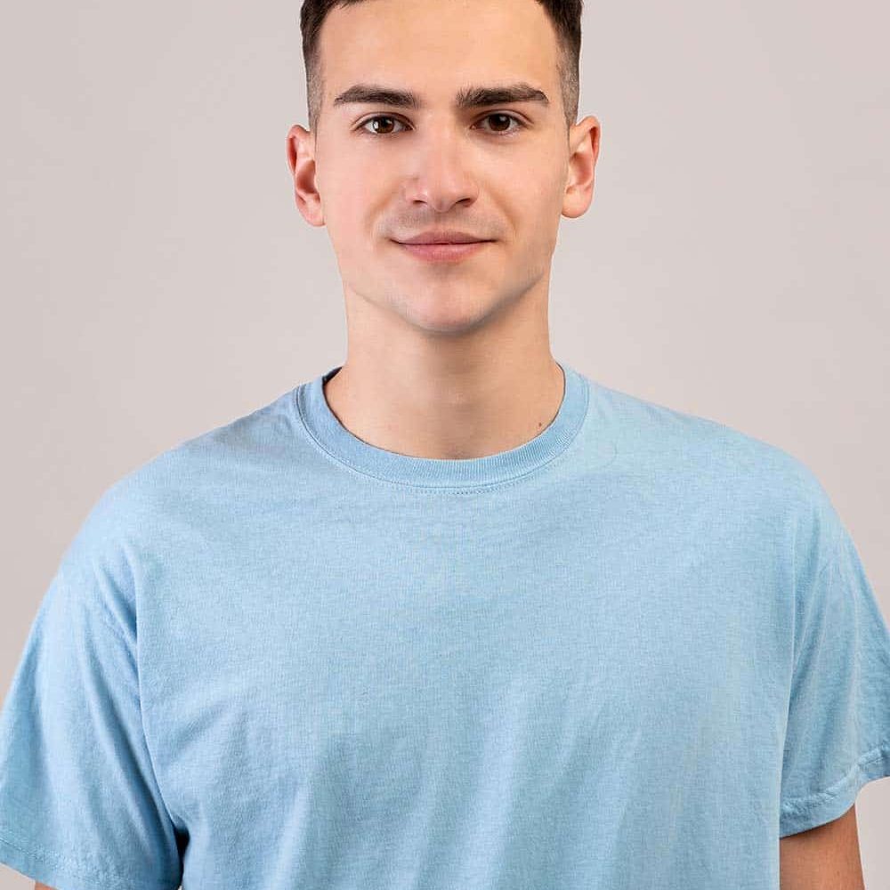 portrait-of-positive-young-guy-in-t-shirt-looking-GKPQ7BL.jpeg